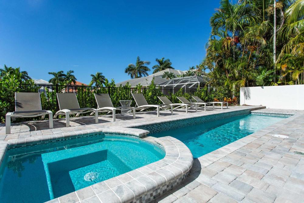 Sorrento Vacation Rental - Expansive Pet Friendly 5 BR 4,5 BA Home with Private Pool and Hot Tub Just a Short Walk to Delnor Wiggins State Park Beach!